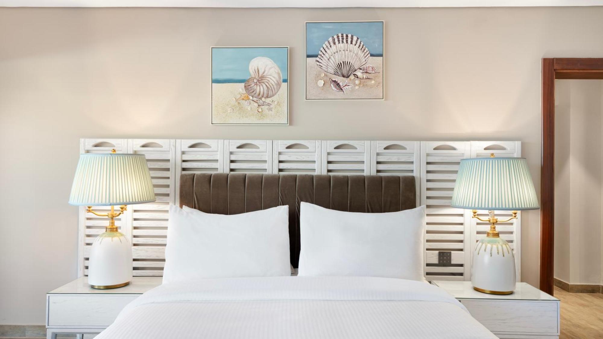 Rixos Premium Alamein エル・アラメイン 部屋 写真 A bedroom at Hilton Garden Inn